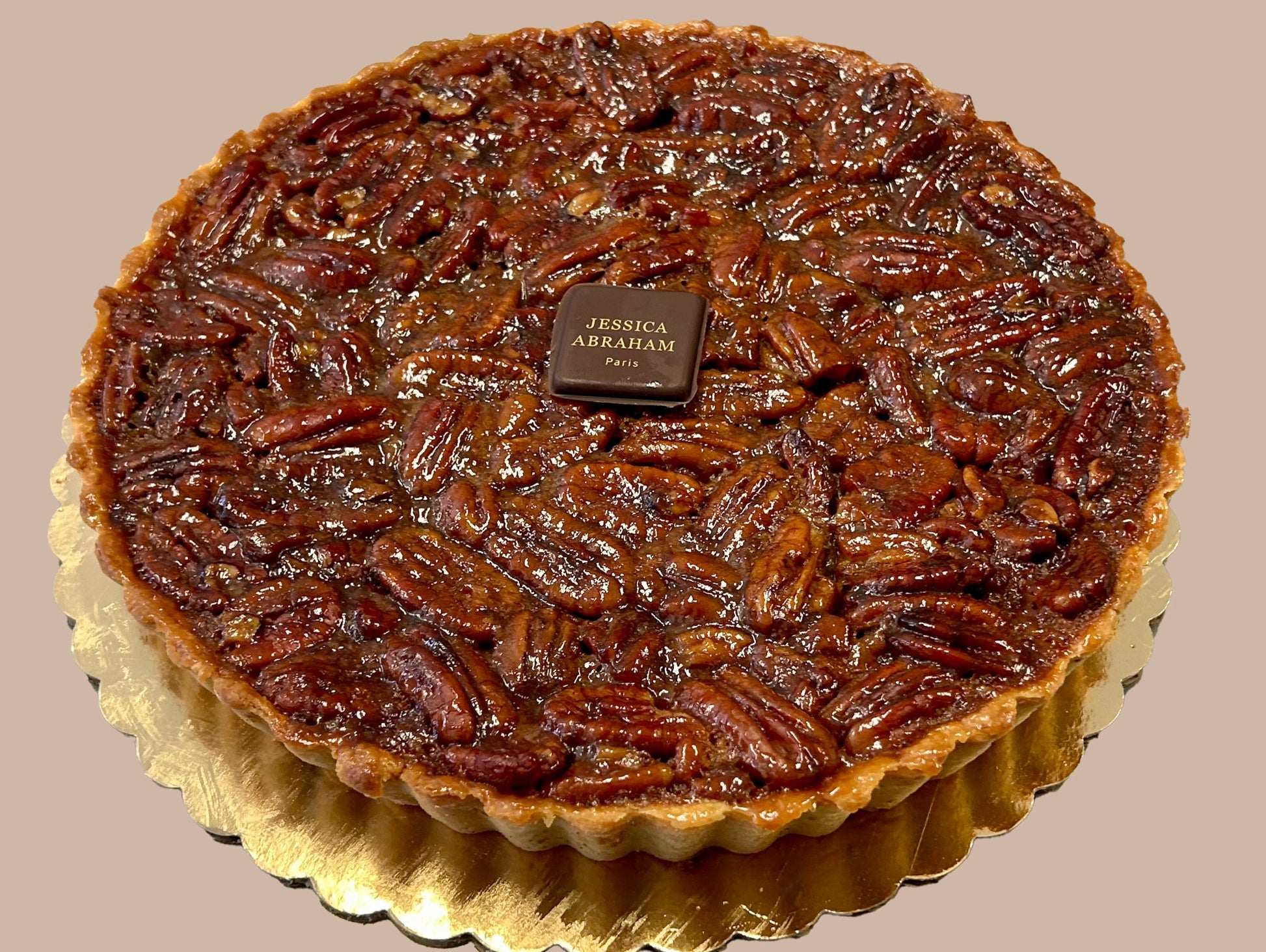 Bourbon Pecan pie with 'jessica abraham' ochocolate nameplate